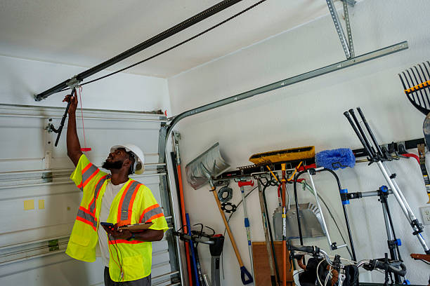 Professional Garage Door Panel Replacement technician working in Tate County County, MS